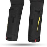 BELA - Pantaló tèxtil Transformer negre/groc fluor